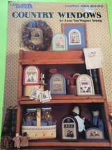 An item in the Crafts category: Leisure arts country windows by and Van Wagner young cross stitch book