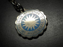 Smithsonian Institution Key Chain Washington DC Aqua Blue Sunburst Silver Color - $6.99