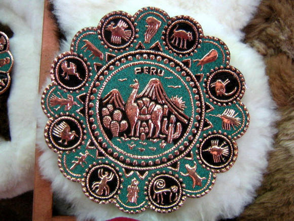 Wall plate from Peru, copper with turquoise stones  - $40.00