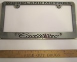 LICENSE PLATE Plastic Car Tag Frame WOODLAND MOTORS Cadillac 10V - £21.26 GBP