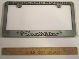 LICENSE PLATE Plastic Car Tag Frame WOODLAND MOTORS Cadillac 10V - £21.02 GBP