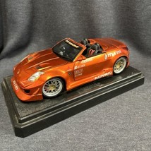 Muscle  Machine NISSAN Convertible 1/18 scale diecast ORANGE Nism Advan - $44.55