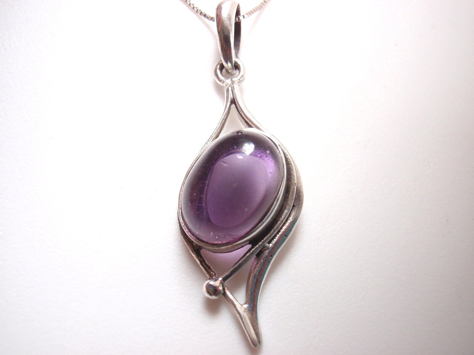 Simulated Amethyst Framed in Curves 925 Sterling Silver Necklace - $18.89