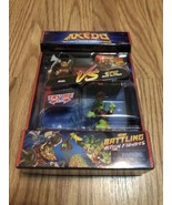 Akedo Ultimate Arcade Warriors Axel vs Epic Miss Slither Action Figures - $27.83 CAD