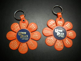 Union Plaza Hotel Casino Las Vegas Key Chain Set of Two Orange Flower Blooms - £5.58 GBP