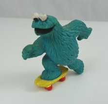 The Muppets Applause Cookie Monster Riding Skateboard 2.75" Collectible Figure - $9.69