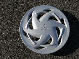 One genuine 1997 to 1999 Mitsubishi Eclipse 16 inch hubcap wheel cover - $20.75