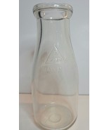 ONE PINT MILK BOTTLE EMBOSSED WITH 7 MINN SEALED 52 LC - $16.83