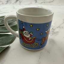 Vintage 90s Christmas Coffee Mug Blue White Santa Reindeer Holiday Cup - $24.38 CAD