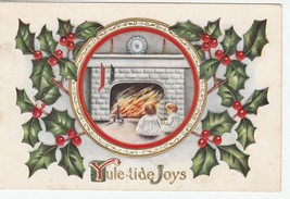 Vintage Postcard Christmas Children and Stockings By Fireplace Embossed - $9.89