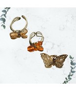 Three metal butterly rings - £1.90 GBP