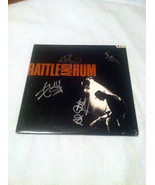 U2     autographed    signed    #1   Record   * proof - $1,367.69 CAD