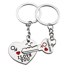 alloy creative lover heart shape and key pair keychain - $14.00