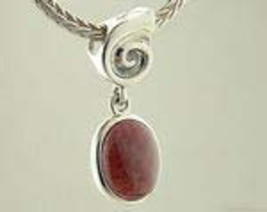 PET007 Sterling Silver Swirl with Enclosed Red Jewel Pendant - $24.99