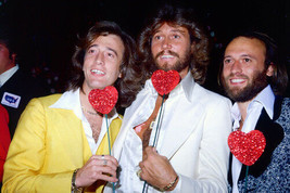 The Bee Gees 11x17 Mini Poster holding hearts - £10.15 GBP