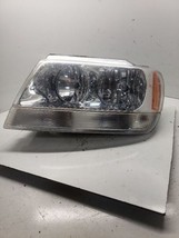 Driver Headlight Crystal Clear Fits 99-04 GRAND CHEROKEE 1097000 - $24.74