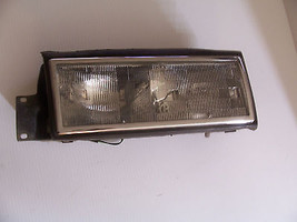 1990 1989 DEVILLE LEFT HEADLIGHT OEM USED ORIGINAL CADILLAC GM FWD FLEET... - £181.22 GBP