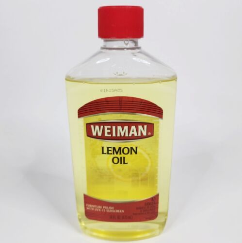 Primary image for Weiman Lemon Oil Furniture Wood Polish with UVX-15 Sunscreen 16 Oz Open Bottle