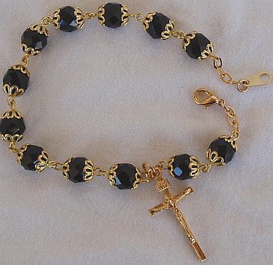 Black glass beads bracelet with golden cross