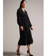 Ted Baker elegant black dress is the epitome of sophisticated style - $2,820.34 MXN