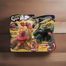 Heroes of Goo Jit Zu Versus Pack Golden Blazagon Vs. Rock Jaw Super Oozy Squishy - $16.69