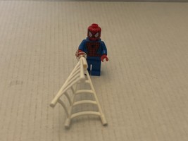 Official LEGO Marvel Comics Spider-Man with Webbing MiniFigure - $217.28 MXN