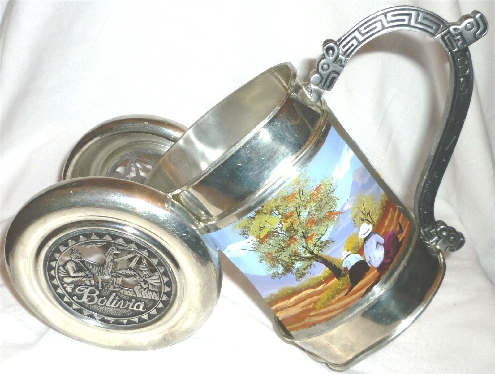 HANDCRAFTED PEWTER WINE BOTTLE CANNON HOLDER PAINTED SCENERY BOLIVIA CREATIONS - $38.00