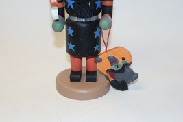 Vintage 10&quot; Tall Halloween Nutcracker Black w/ Green Face Holding Ghost &amp; Witch - £23.73 GBP