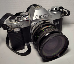 CANON AL-1 QF 35MM SLR FILM CAMERA w/pro 50mm f/1.8 FD LENS Fully functi... - £92.50 GBP