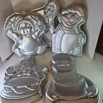 Vintage Lot of 5 Wilton Cake Pans Sesame Street, Cabbage Patch, Donald Duck - $557.80 MXN