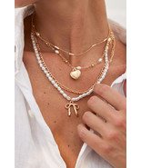 Gold Bow and Heart Pendant Pearl Chain Necklace Set - $5.13