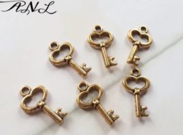 10 Key Charms Antique Gold Tone Steampunk Pendants Miniatures 15mm - £1.55 GBP