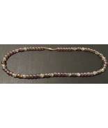 Beaded necklace; clear and brown; gold spacers; 22 inches long - $31.45 CAD