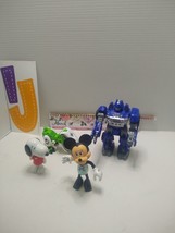 A toy lot of 4 Mickey Mouse Snoopy Transformer Dinosaur. - £13.56 GBP