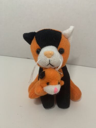Primary image for Oriental Trading Halloween small plush orange black cat holding kitten in mouth