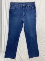 Vintage Wrangler Men&#39;s Size 34&quot; W x 29&quot; L Blue Denim Distressed Jeans - $12.34