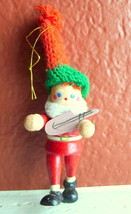 Santa Claus Wooden Christmas Ornament 1984 vintage with instrument - $7.87