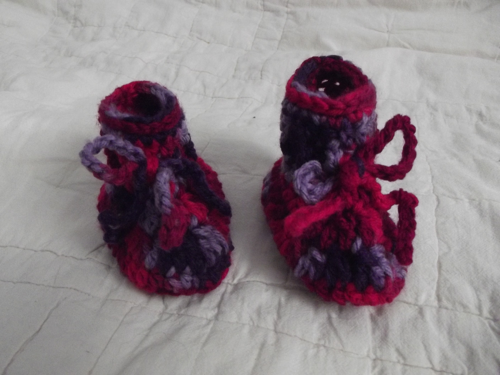 CUTE BABY BOOTIES IN SHADES OF PURPLES AND PINKS GIRL HAND MADE NEW - $8.00
