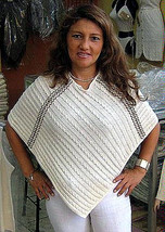 white Poncho from  - £51.15 GBP