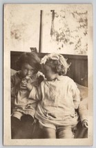 RPPC All The Cuteness Little Girls Shares Her Treat Real Photo Postcard Q25 - £10.10 GBP