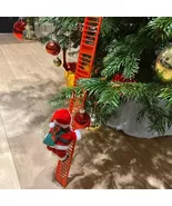 Electric Climbing Santa Claus Ladder Music Doll Christmas Ornament - $437.06 MXN