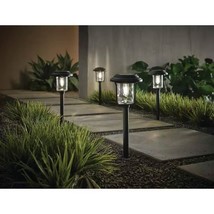 4 Pack - Solar LED Light Set - Outdoor Path Lighting in Black - $2,510.81 MXN