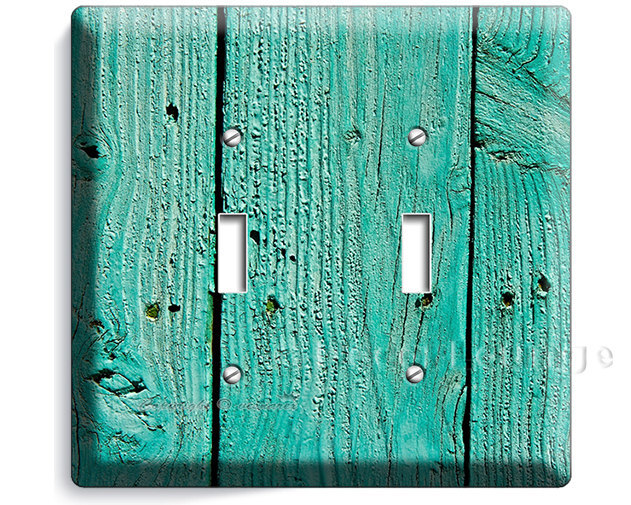 Worn out old painted green rustic country wood double light switch wall plate co