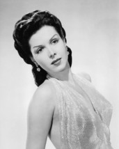 Ann Miller 16x20 Poster in low cut gown - $19.99