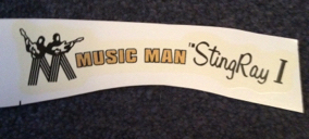 Musicman type logo waterslide headstock decals in metallic gold