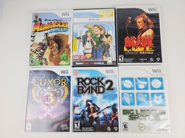 Lot of 6 Wii Video Game Discs Madagascar-SSX Blur-AC/DC-Luxor 3-Rock Band 2  +1 - £17.72 GBP