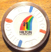 (1) $1. HILTON CASINO CHIP - Atlantic City, New Jersey - Rainbow Chip - $14.95