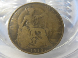 (FC-821) 1918 United Kingdom: One Penny { Halo effect obverse-to-reverse }  - $85.00