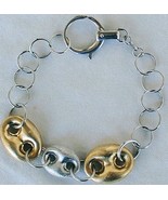Golden silver bracelet - $65.64 CAD