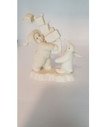 Department 56 SNOWBABIES Carrying Presents with Penguin - $339.84 MXN